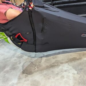 A sleek Ozone Ozium 2 pod harness with a Gin Yeti UL reserve parachute, displayed in mint condition, ready for sale.