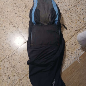Advance Lightness 2 ultralight pod harness in black/blue on display with backpack and carabiners, good condition with minor front cockpit wear