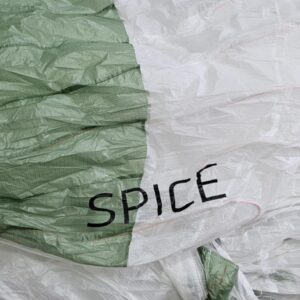 Skywalk Spice 2 paraglider, size S, in mint condition, color white/green, available for sale with only 5 hours of flight time, perfect for intermediate to advanced pilots.