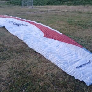 Gin Boomerang 12 size SM competition paraglider laid out for inspection in excellent condition – perfect for experienced pilots seeking a racing machine