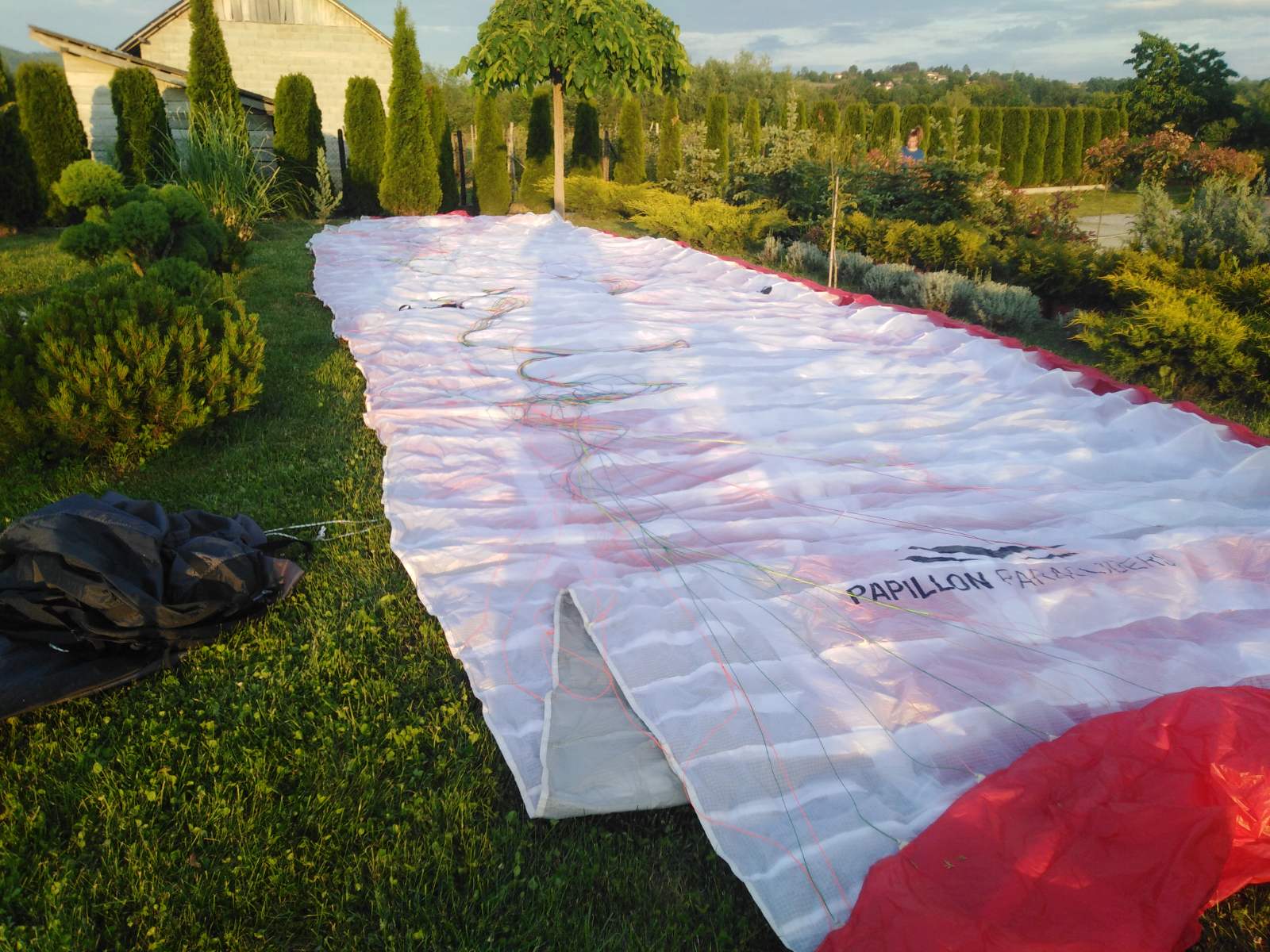 "Tandem Papillion P42 paraglider with full kit including harnesses, reserve, and accessories in excellent condition, for sale second hand."