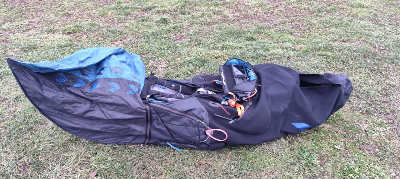 Used Kortel Kanibal Race 2 paraglider harness in good condition, perfect for long XC flights and competitive pilots, photographed indoors in Montenegro