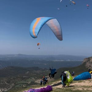 Ozone Alpina 4 ultralight second-hand paraglider in excellent condition, ready for hike and fly adventures — size ML, May 2022, 130h.