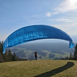 Used 777 Q-Light 3 ultralight EN C paraglider in blue, size ML, excellent condition for hike and fly pilots.