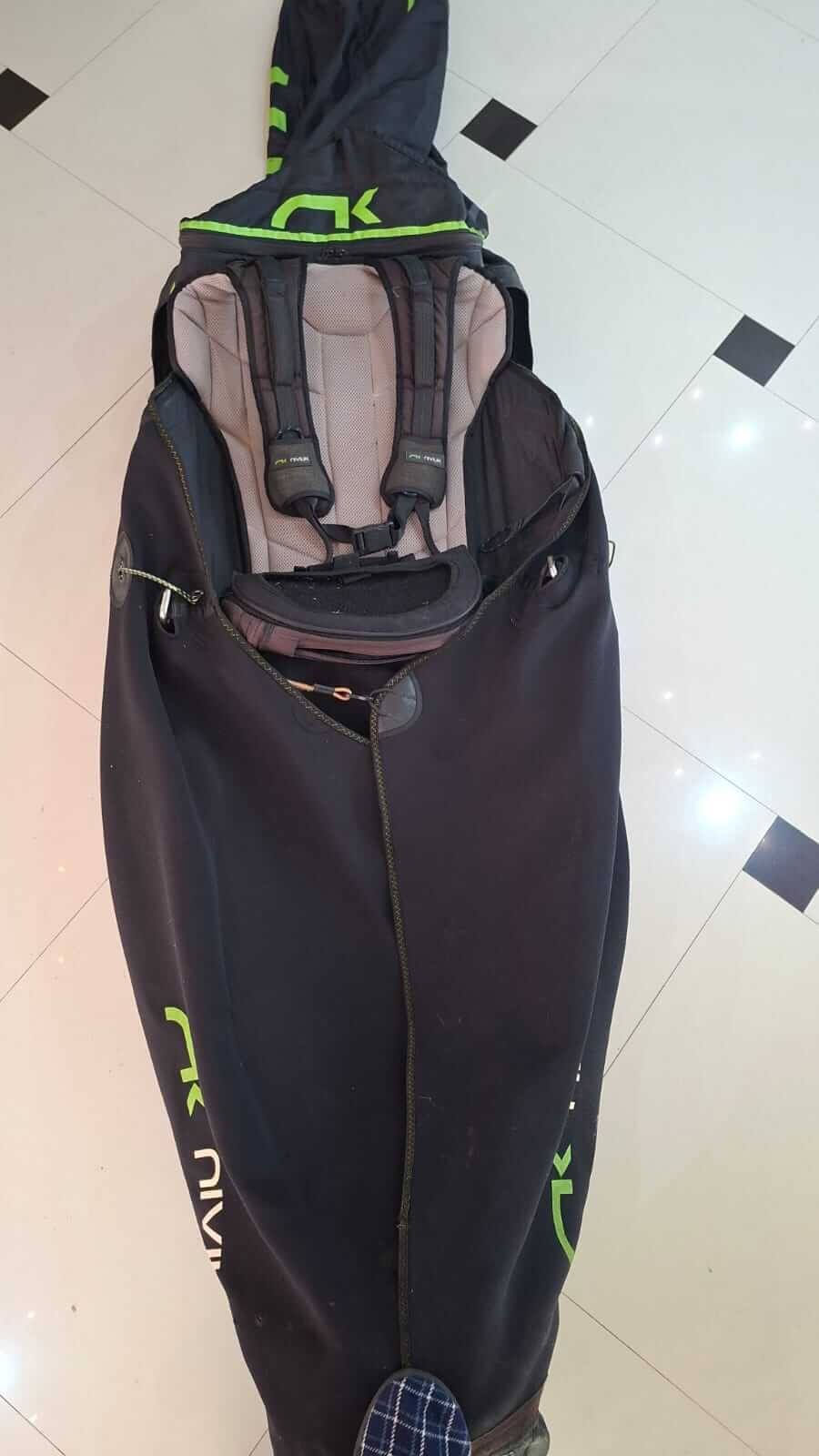 Niviuk Drifter pod harness in very good condition laid out, aerodynamic fairing visible, used paraglider competition harness for sale Serbia